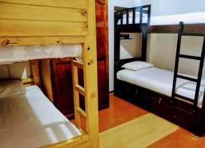 habitacion cuadruple banos ecuador